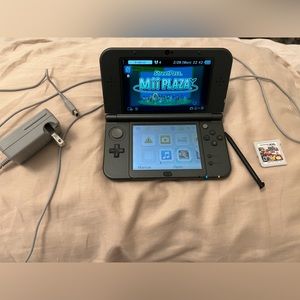 Nintendo New 3DS - black + super smash bros